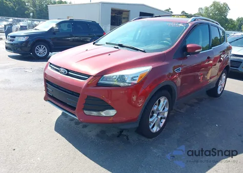 2016 Ford Escape Titanium z USA, uszkodzony, nr VIN 1FMCU9JXXGUC33092